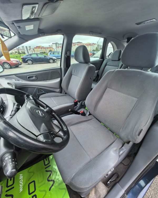 Nissan Almera Tino I · Рестайлинг - Image 10